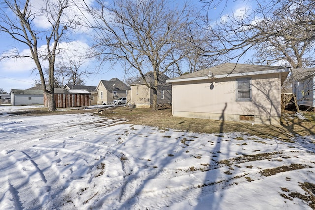 view of yard covered in snow