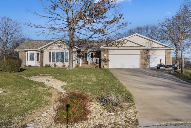 ranch-style home with a front yard and a garage