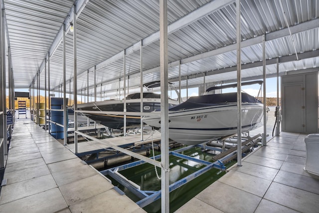 view of dock with a water view