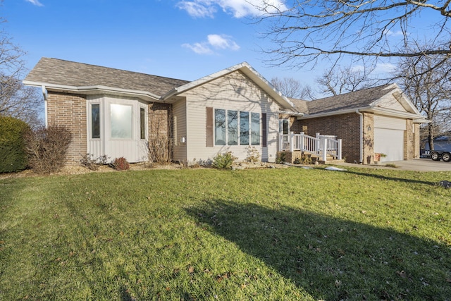 ranch-style home with a front lawn and a garage