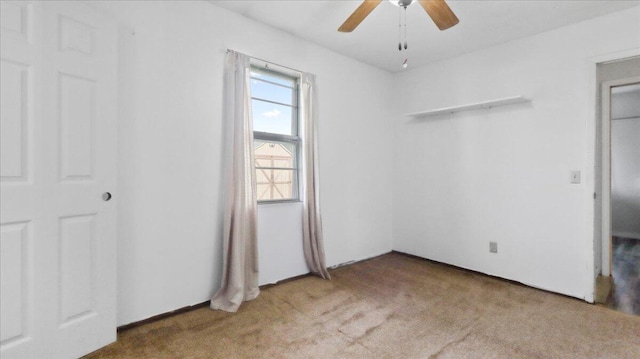 1933 Lynn Dr, West Plains, MO 65775 - unfurnished bedroom featuring carpet floors and a ceiling fan