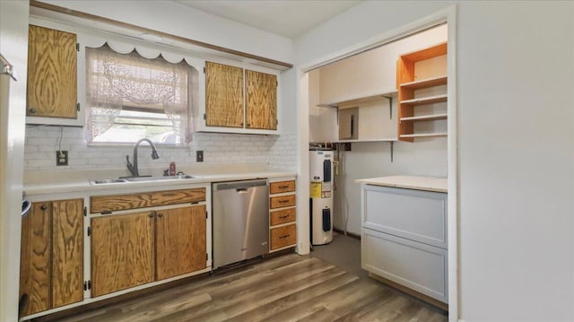 1933 Lynn Dr, West Plains, MO 65775 - kitchen featuring dishwasher, a sink, electric water heater, backsplash, and light countertops