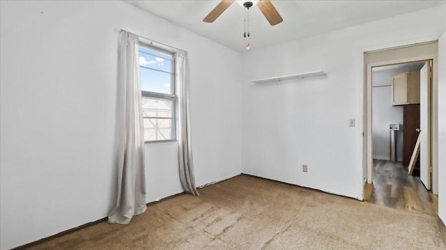 1933 Lynn Dr, West Plains, MO 65775 - unfurnished bedroom featuring carpet floors and a ceiling fan