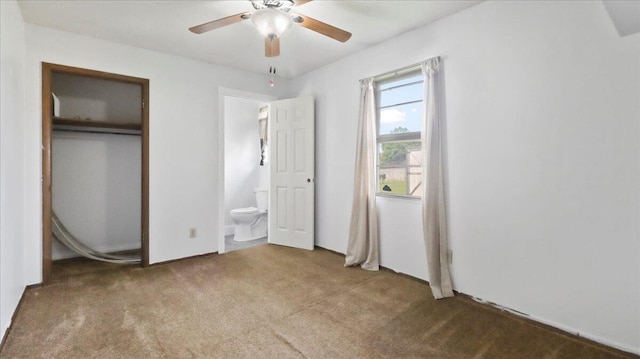 1933 Lynn Dr, West Plains, MO 65775 - unfurnished bedroom featuring carpet, ensuite bathroom, and a ceiling fan