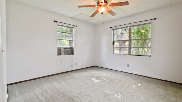 1933 Lynn Dr, West Plains, MO 65775 - carpeted spare room with healthy amount of natural light, cooling unit, a ceiling fan, and baseboards
