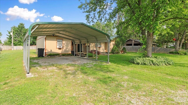 1933 Lynn Dr, West Plains, MO 65775 - view of parking with a carport and driveway