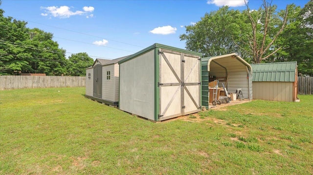 1933 Lynn Dr, West Plains, MO 65775 - view of shed featuring a carport