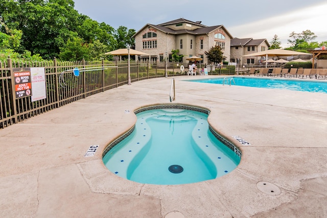158 Troon Dr Unit 20, Branson, MO 65616 - community pool featuring a patio