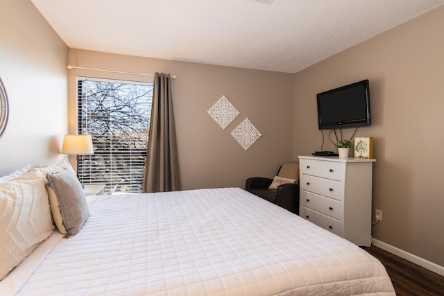 158 Troon Dr Unit 20, Branson, MO 65616 - bedroom with wood finished floors and baseboards