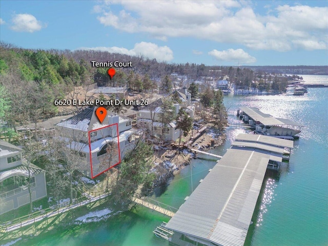 birds eye view of property featuring a water view