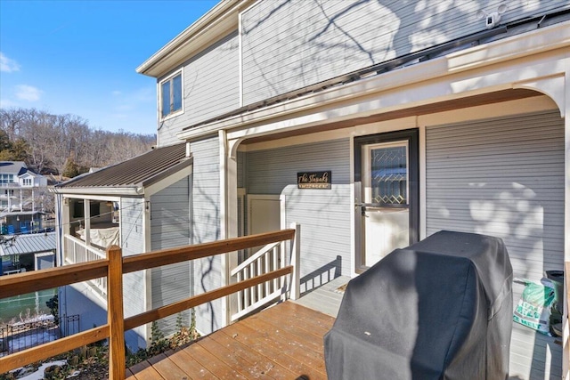 doorway to property with a wooden deck