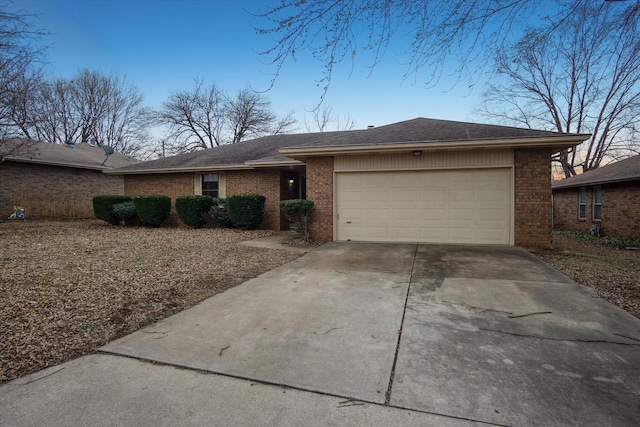 single story home featuring a garage