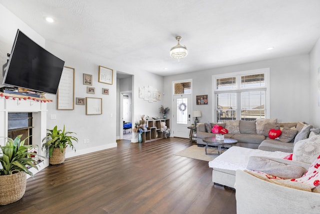 living room with dark hardwood / wood-style floors