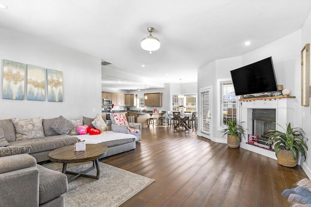 living room featuring dark hardwood / wood-style flooring