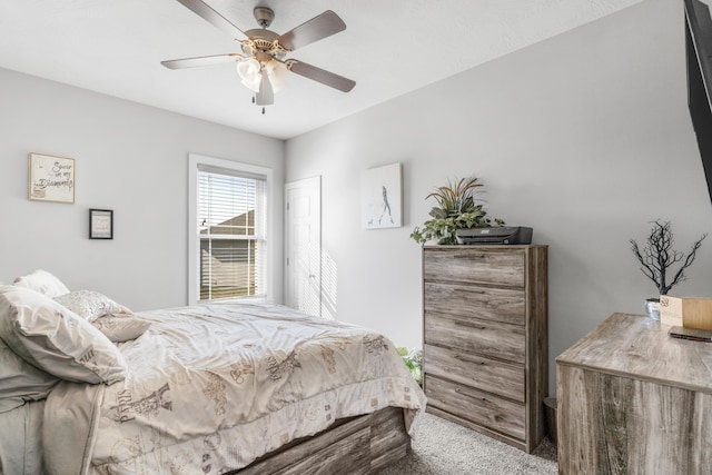 bedroom with ceiling fan and carpet