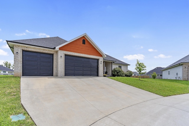1360 N Rainbow Ct, Nixa, MO 65714 - view of front facade with brick siding, concrete driveway, an attached garage, and roof with shingles