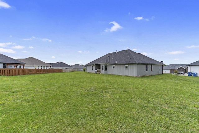 1360 N Rainbow Ct, Nixa, MO 65714 - back of house featuring roof with shingles