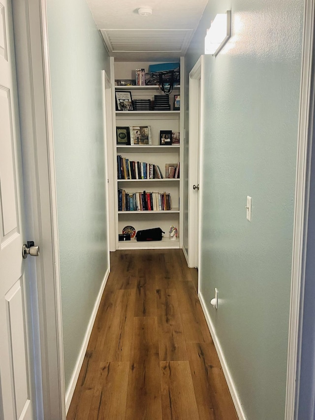 corridor featuring dark hardwood / wood-style flooring