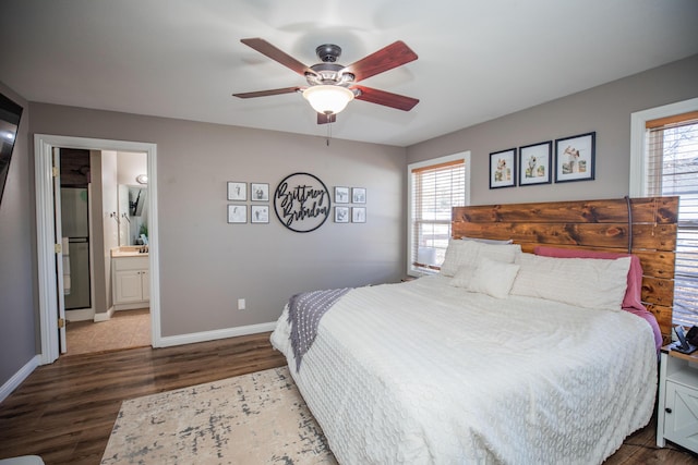 bedroom with ceiling fan, connected bathroom, and dark hardwood / wood-style floors