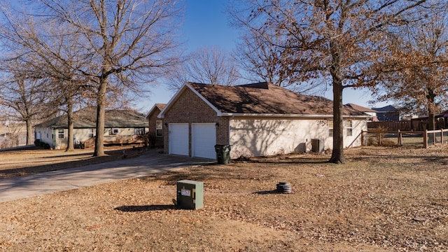 view of home's exterior with a garage