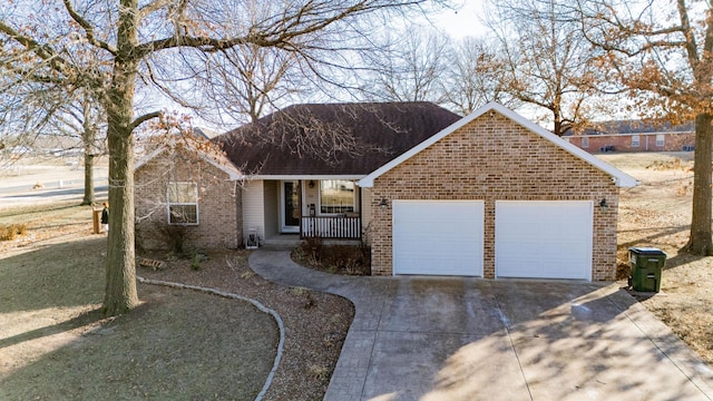 view of front facade featuring a garage and a porch