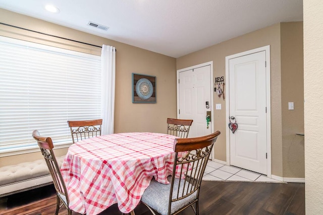 dining area with light wood-type flooring