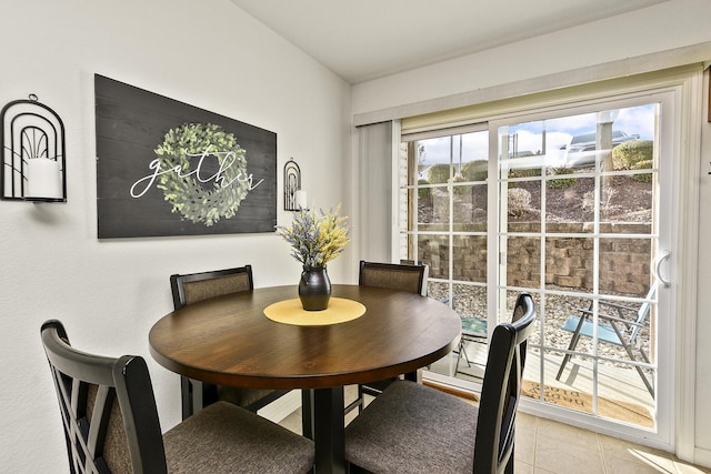 view of tiled dining space