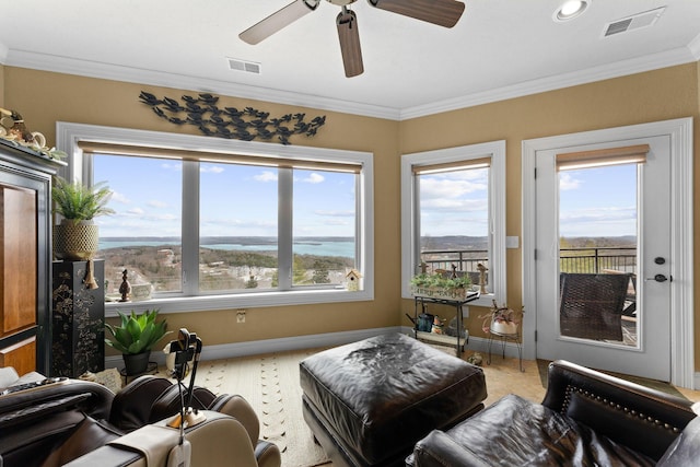 sunroom with ceiling fan