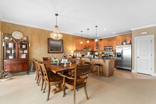 dining room with light carpet, ornamental molding, and a notable chandelier