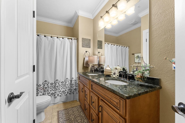 bathroom featuring toilet, ornamental molding, tile patterned floors, and vanity