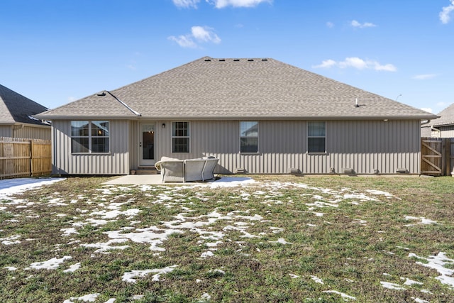 back of property with a patio area