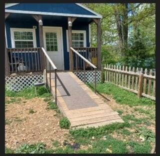 389 Osage Ln, Pineville, MO 64856 - exterior space with a porch and fence