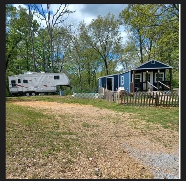 389 Osage Ln, Pineville, MO 64856 - view of yard with a fenced front yard