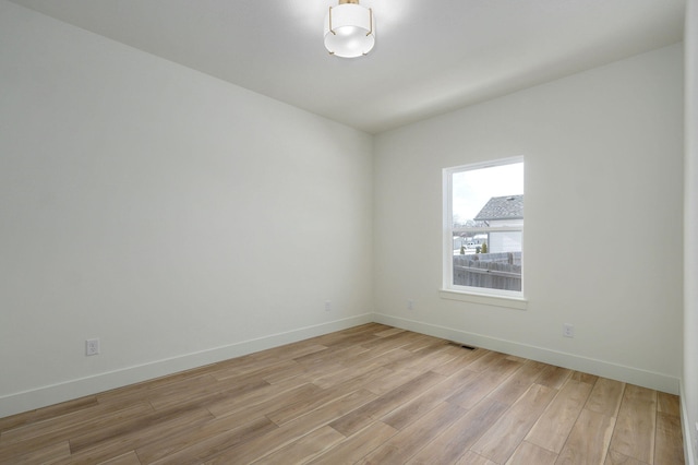 empty room featuring light hardwood / wood-style flooring