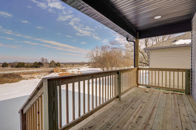 view of snow covered deck