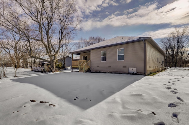 view of snow covered property