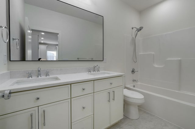 full bathroom featuring toilet, bathtub / shower combination, and vanity