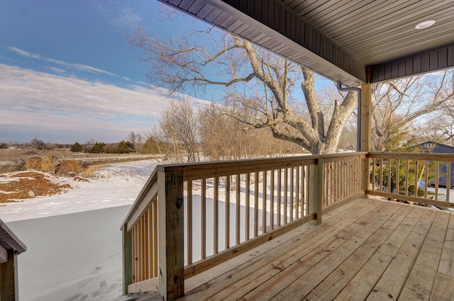 view of snow covered deck