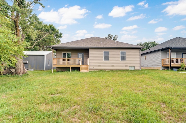 210B W Clinton St, Rogersville, MO 65742 - back of property featuring a deck, a yard, and a storage unit