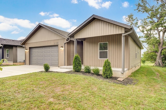 210B W Clinton St, Rogersville, MO 65742 - view of front of home featuring a garage, driveway, a front lawn, and board and batten siding
