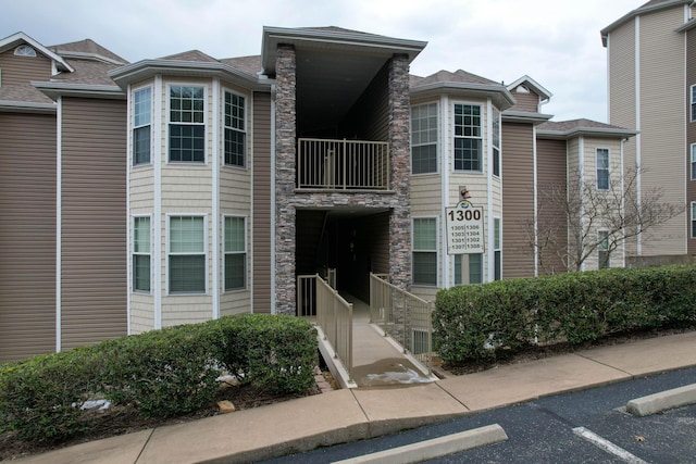 view of front of home with a balcony