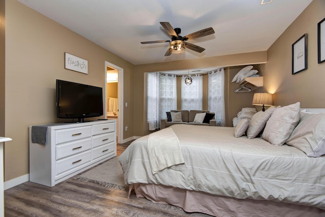 bedroom with ceiling fan and hardwood / wood-style floors