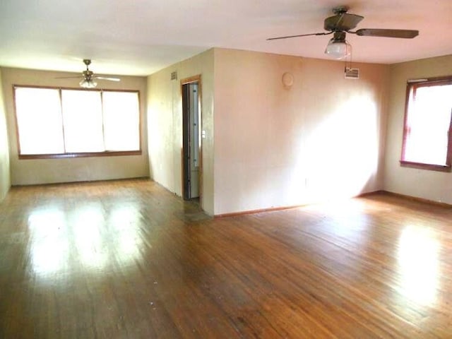 spare room with ceiling fan and light hardwood / wood-style floors