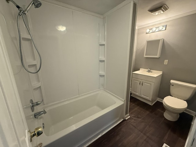 full bathroom with toilet, hardwood / wood-style flooring, crown molding, tub / shower combination, and vanity