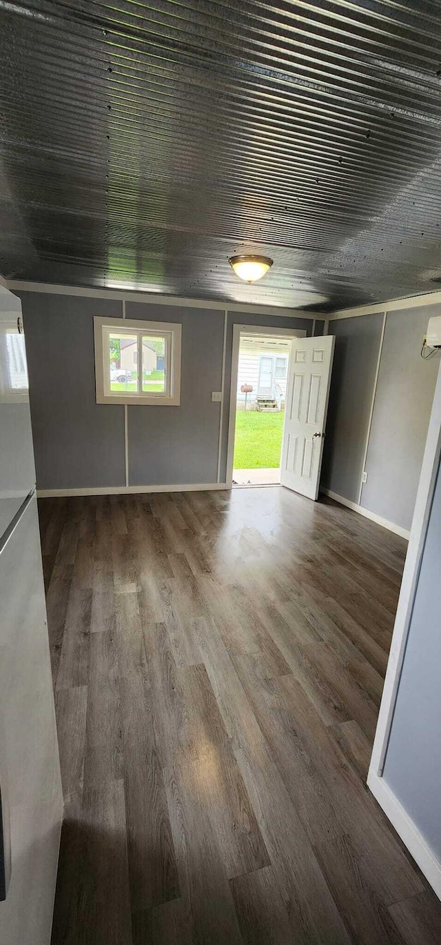 empty room with wood-type flooring