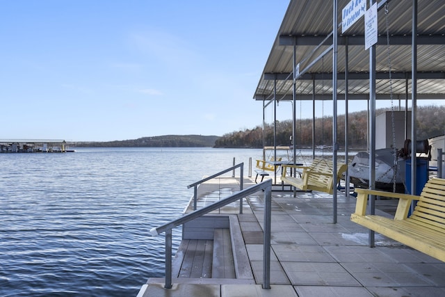 view of dock with a water view