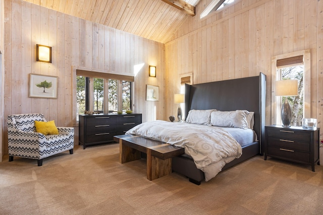 carpeted bedroom featuring beam ceiling, wood ceiling, wood walls, and high vaulted ceiling