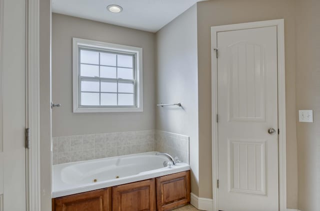 bathroom featuring a bath