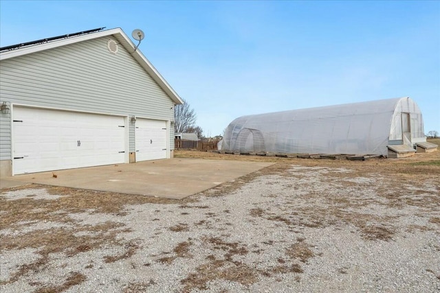 exterior space with an outbuilding