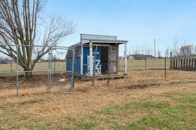 view of outbuilding with a lawn